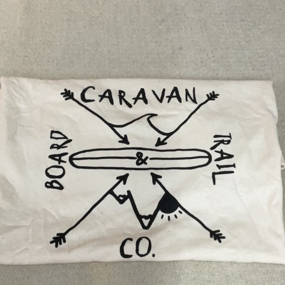 White and Black Circular Design with Bird Motif